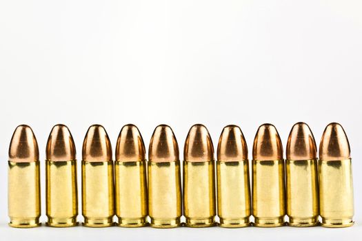 9 mm bullets on a white background isolated