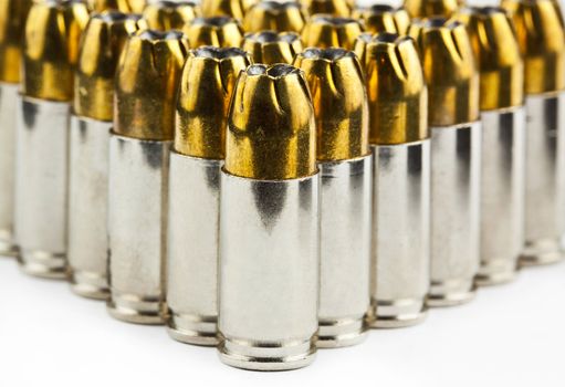 9 mm bullets on a white background isolated