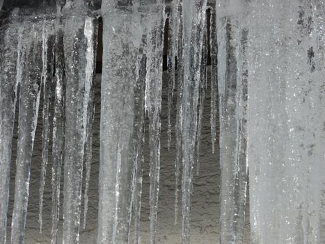 icicles hanging from the roof outside in landscape