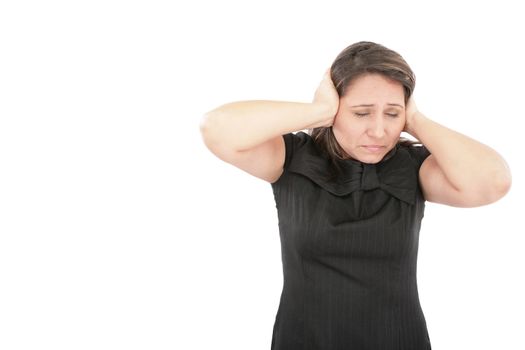 Stressed young woman covering his ears, grimacing and gesturing stop the noise