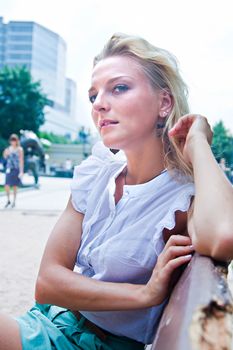 Young and beautiful woman relaxing in the park