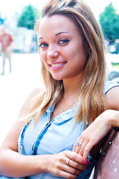 Young and beautiful woman relaxing in the park