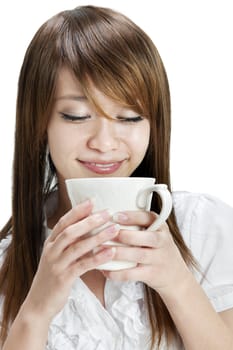 Asian female holding a cup over white background