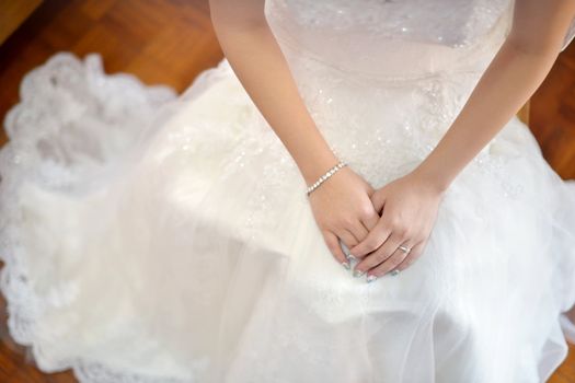 Asian bride is waiting for groom arriving
