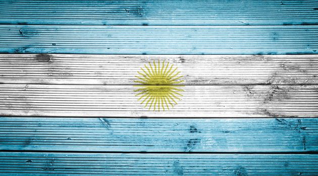 Natural wood planks texture background with the colors of the flag of Argentina