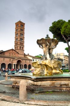 Santa Maria in Cosmedin basilica and fountain - Bocca della verita - Roma - Italy