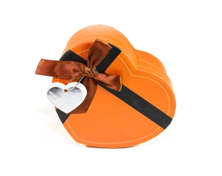 Orange Heart-shaped box in heart shape on white background