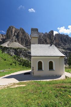 small chapel  in Gardena pass, Italy. On background Sella mount