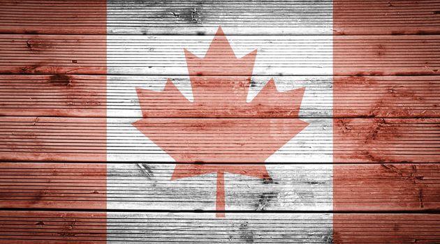 Natural wood planks texture background with the colors of the flag of Canada