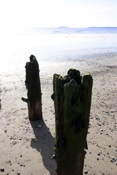 sunshine over the beach breakers in Youghal county Cork Ireland on a summers day