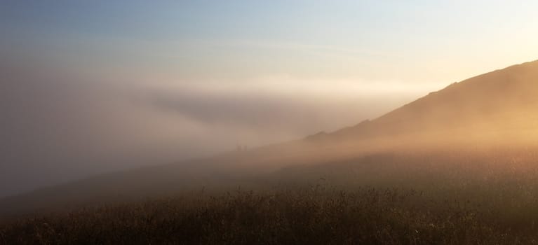 Sea fog engulfing the hills at Corfe Castle