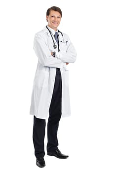 Photo of a young handsome doctor smiling and standing with his arms crossed.
