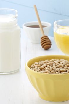 Delicious and nutritious lightly toasted honey, nuts and oats cereal with milk.