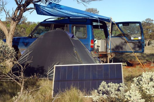 Camping in the Australian bush with solar panels to reload the batteries