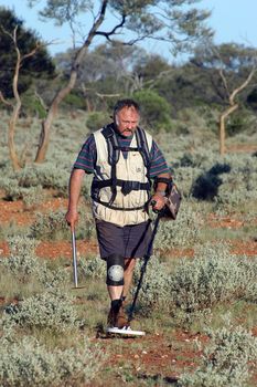 Gold bearing prospection in the Australian bush in quad to have a larger research area and to find the most beautiful gold nuggets.