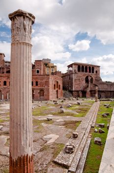 Roman Column and Casa Dei Cavalieri di Rodi at Foro Traiano in Rome - Italy