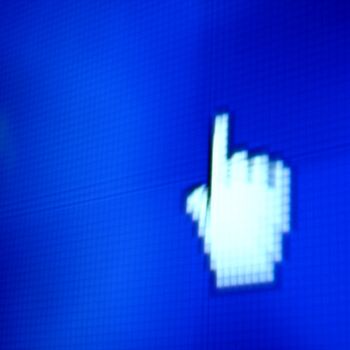 finger corsor on blue pixel screen