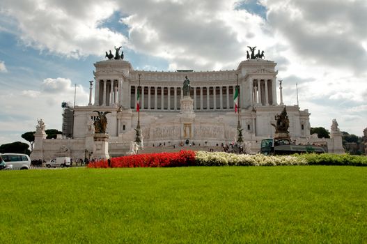 Monumento a Vittorio Emanuele II main fachade with grassyard at Roma - Italy