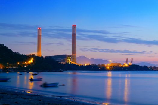 industrial power plant night landscape with lights 