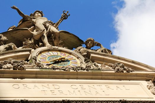 Sculpture and clock on the facade of Grand Central Station in New York City.