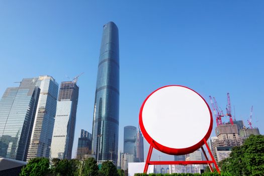 chinese big drum and modern city as background for advertising