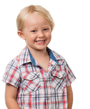 Portrait of a very cute happy young and smiling boy. Isolated on white.