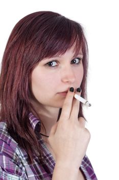 young red haired woman is smoking a cigarette - isolated on white background