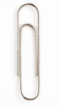 Large paper clip close-up isolated on white clipping path.