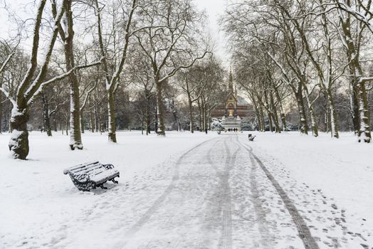 Hyde Park covered in snow with Albert Memorial in the background after three days of blizzards.