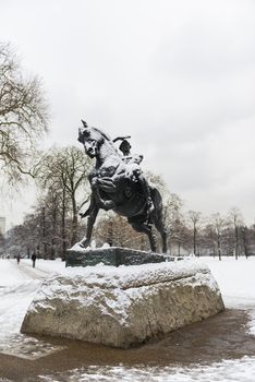 LONDON, UK - JANUARY 21: Statue in covered in snow in Hyde Park after three days of blizzards. January 21, 2013 in London.