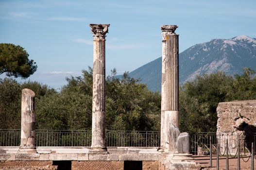 Three Columns background mountain at Villa Adriana in Tivoli - Roma - Italy