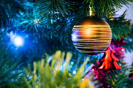 Christmas tree with christmas golden bauble 