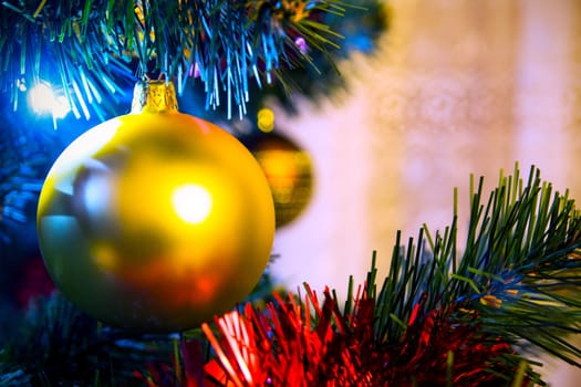 Christmas tree with christmas golden bauble 