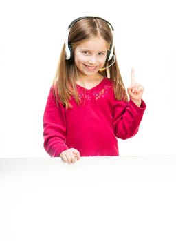 little girl in headset with white banner