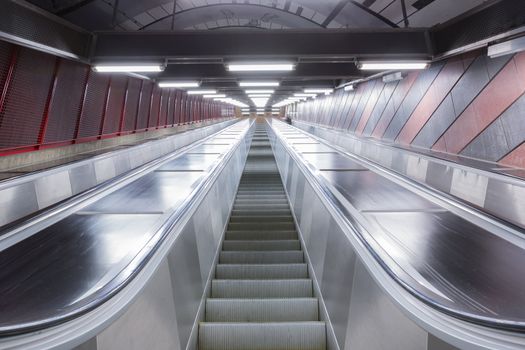 modern escalator in futuristic building