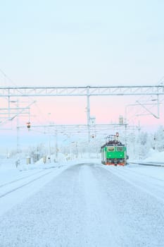 Green Train Locomotive at Kiruna Platform Station terminal Sweden