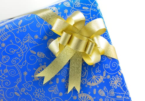 blue gift box with golden ribbon