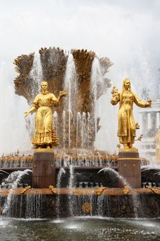 Famous Golden Fountain The Friendship of Nations at All-Russia Exhibition Centre in Moscow, Russia