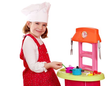 beautiful little girl play cooking