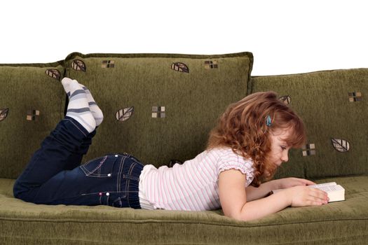 beautiful little girl reading book