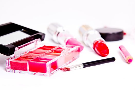 profesional lipstick with brush on white background