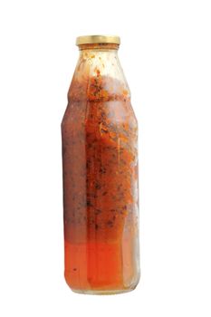 sea buckthorn berries ( Hippophae rhamnoides ) with honey in a glass bottle - traditional medicine