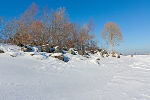 Beautiful winter landscape against blue sky, Russia.