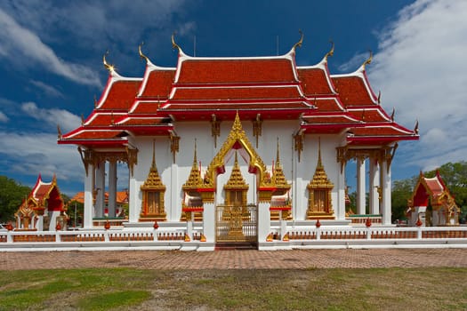 Beautiful Buddhist temple on  background of blue sky, Thailand.