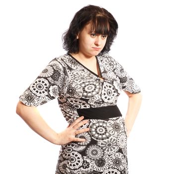 serious pregnant woman looking at something on a white background