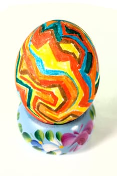 Handmade Painted Easter Egg in a blue cup