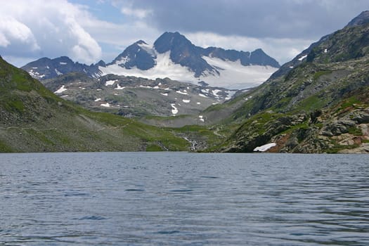 A high mountain walk at the top of the Croix de Fer (French Alps)