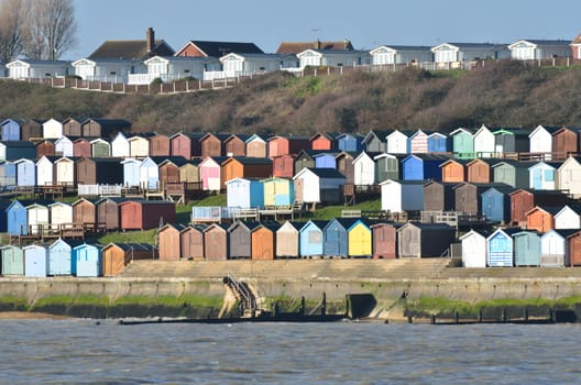 Beach hut and houses and Walton-on-Naze