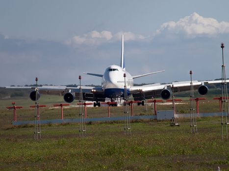 airplane on runway - front view