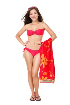 Bikini vacation holidays woman standing isolated holding red towel on white background in studio in full body length. Beautiful fresh multiethnic Asian Chinese / Caucasian sexy female model.